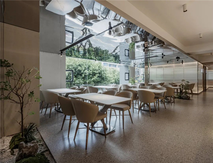 用餐區設計圖-餐廳引導吧臺裝修設計-鄭州宏鈺堂分享綠色現代風港式茶餐廳裝修設計方案